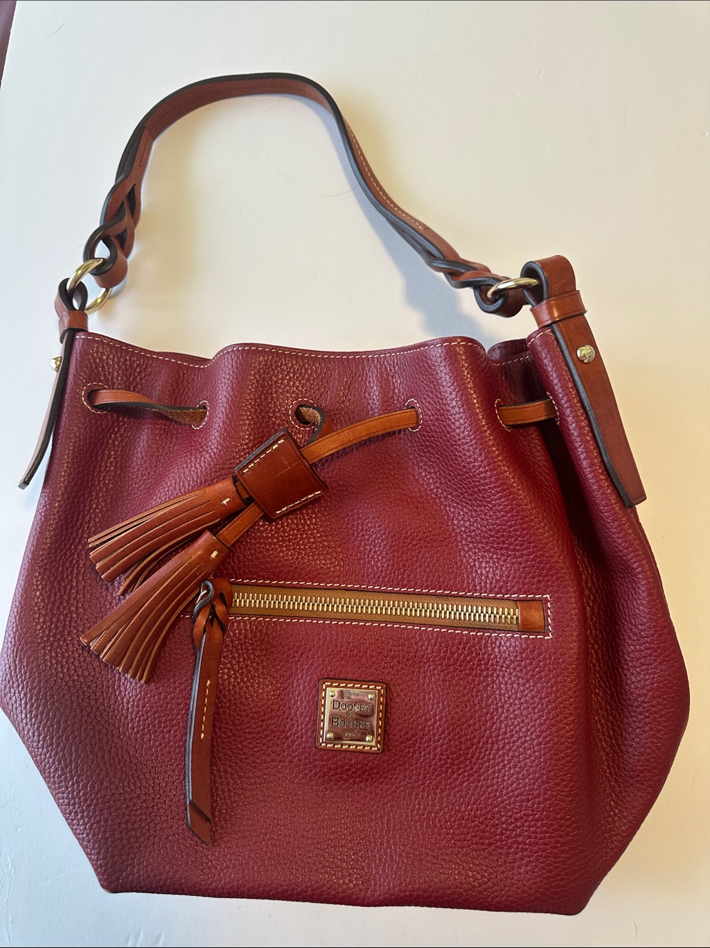 Dooney & Bourke Burgundy Pebbled Leather Drawstring Shoulder Bag